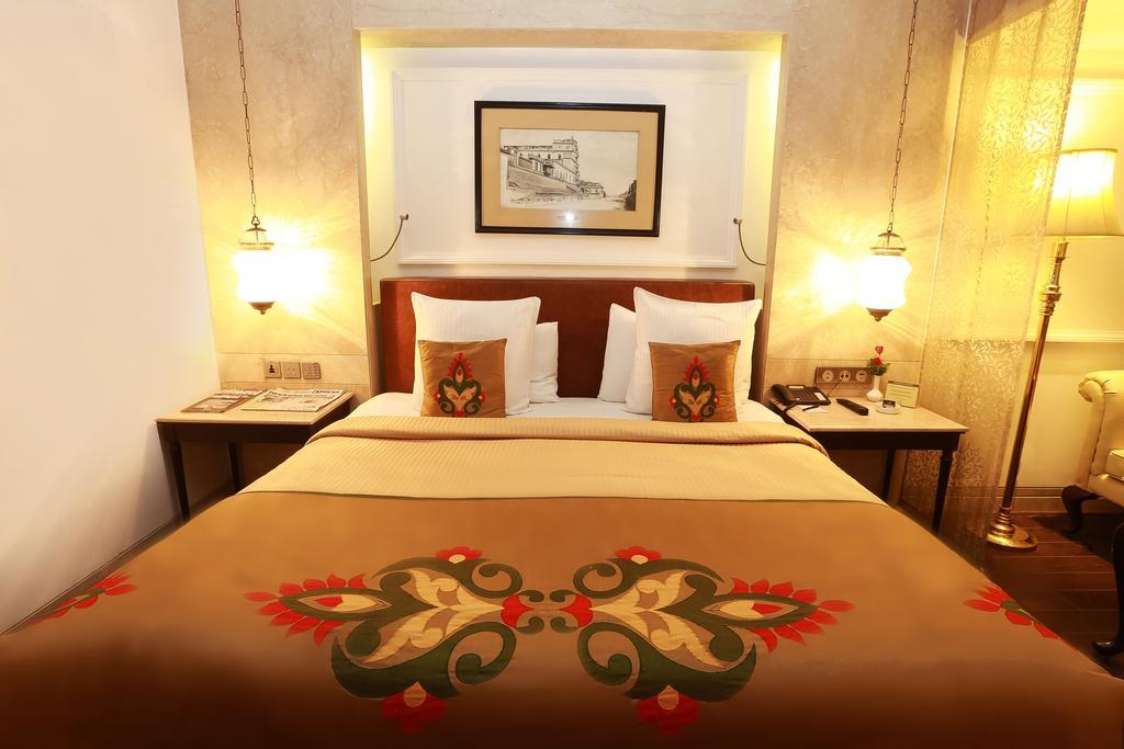 The Ashok, New Delhi Hotel Quarto foto A bedroom at the hotel