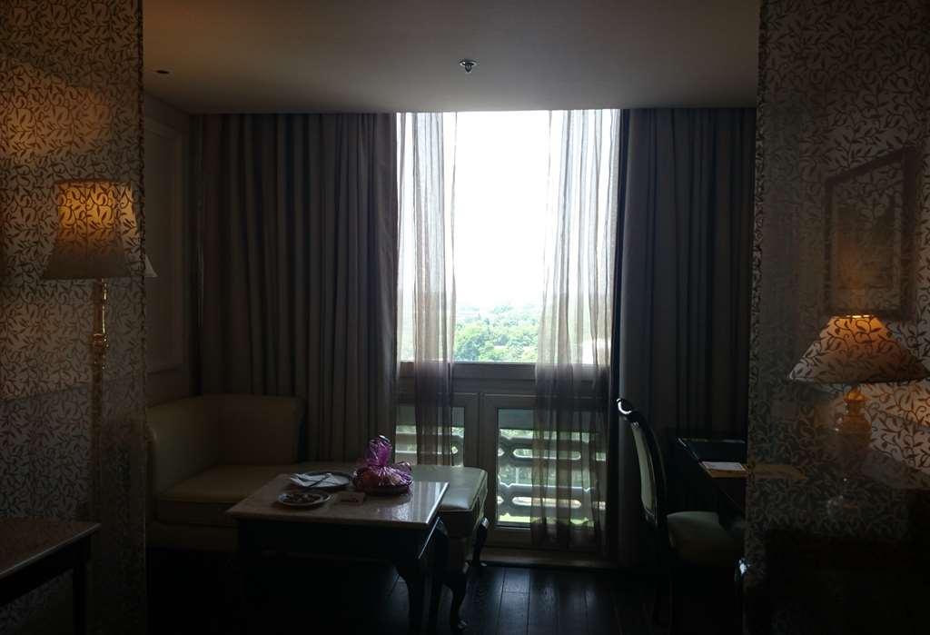 The Ashok, New Delhi Hotel Quarto foto A room at the hotel