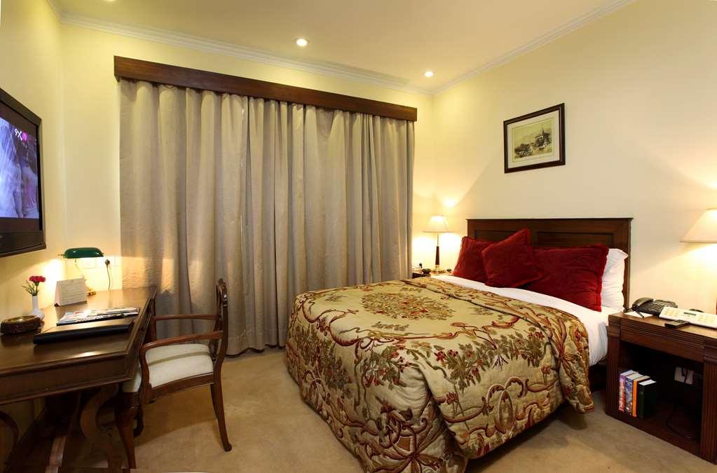 The Ashok, New Delhi Hotel Quarto foto A bedroom at the hotel