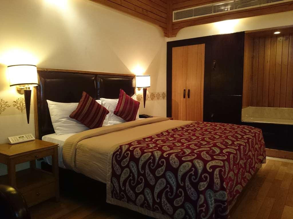 The Ashok, New Delhi Hotel Quarto foto A bedroom at the Taj Bengal